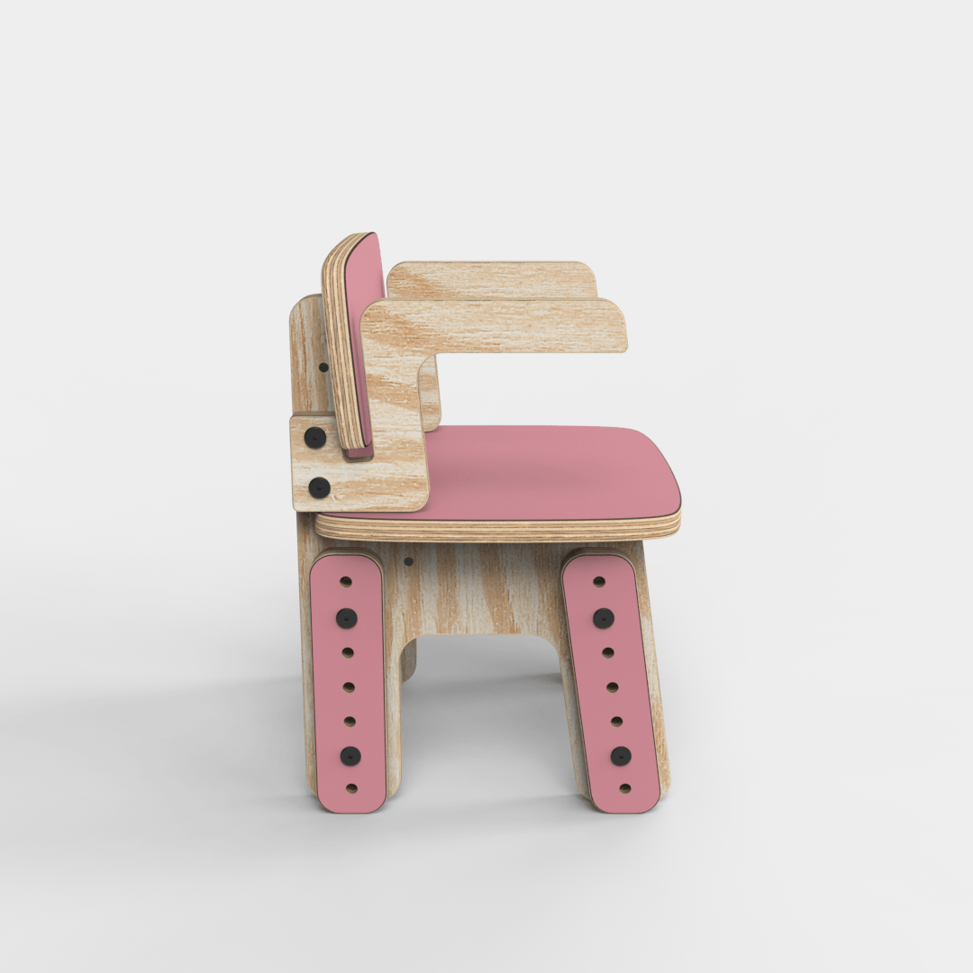 Silla infantil Reni con apoyabrazos rosa en altura mínima, vista lateral